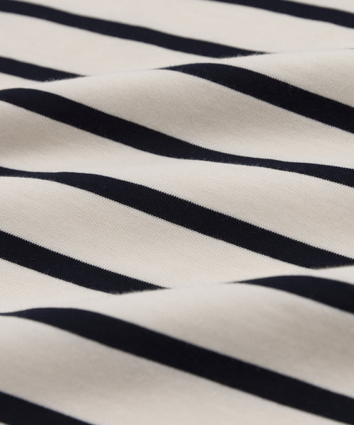 Close-up of the Claude Long-Sleeve Tee, made from 100% cotton with black and white nautical stripes, featuring a soft texture and gentle folds—ideal for a timeless look.