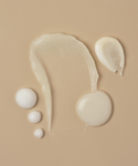 A smooth beige background displays textures from The Youthful Skin Routine: a large translucent smear, a creamy white dollop, three small white droplets, and an off-white swirl—highlighting its deep hydration and anti-aging benefits.