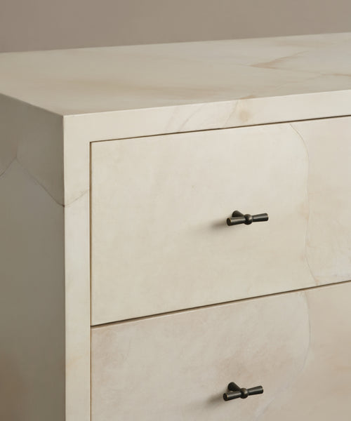 A close-up of the Napa Dresser shows two partially visible solid maple drawers with a marble-like finish and black T-shaped handles.