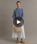 Thumbnail for video: Model wearing Cashmere Fisherman Sweater in Denim.