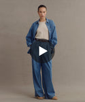 Thumbnail for video: Model wearing Parker Oversized Shirt and Newport Denim Trouser.
