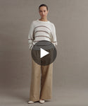 Thumbnail for video: Model wearing Chloe Crewneck in Ivory taupe stripe.